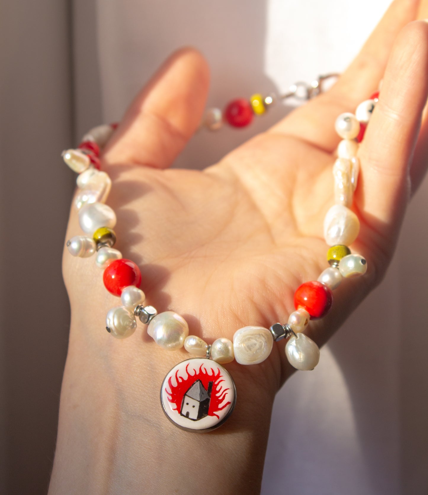 Burning house necklace