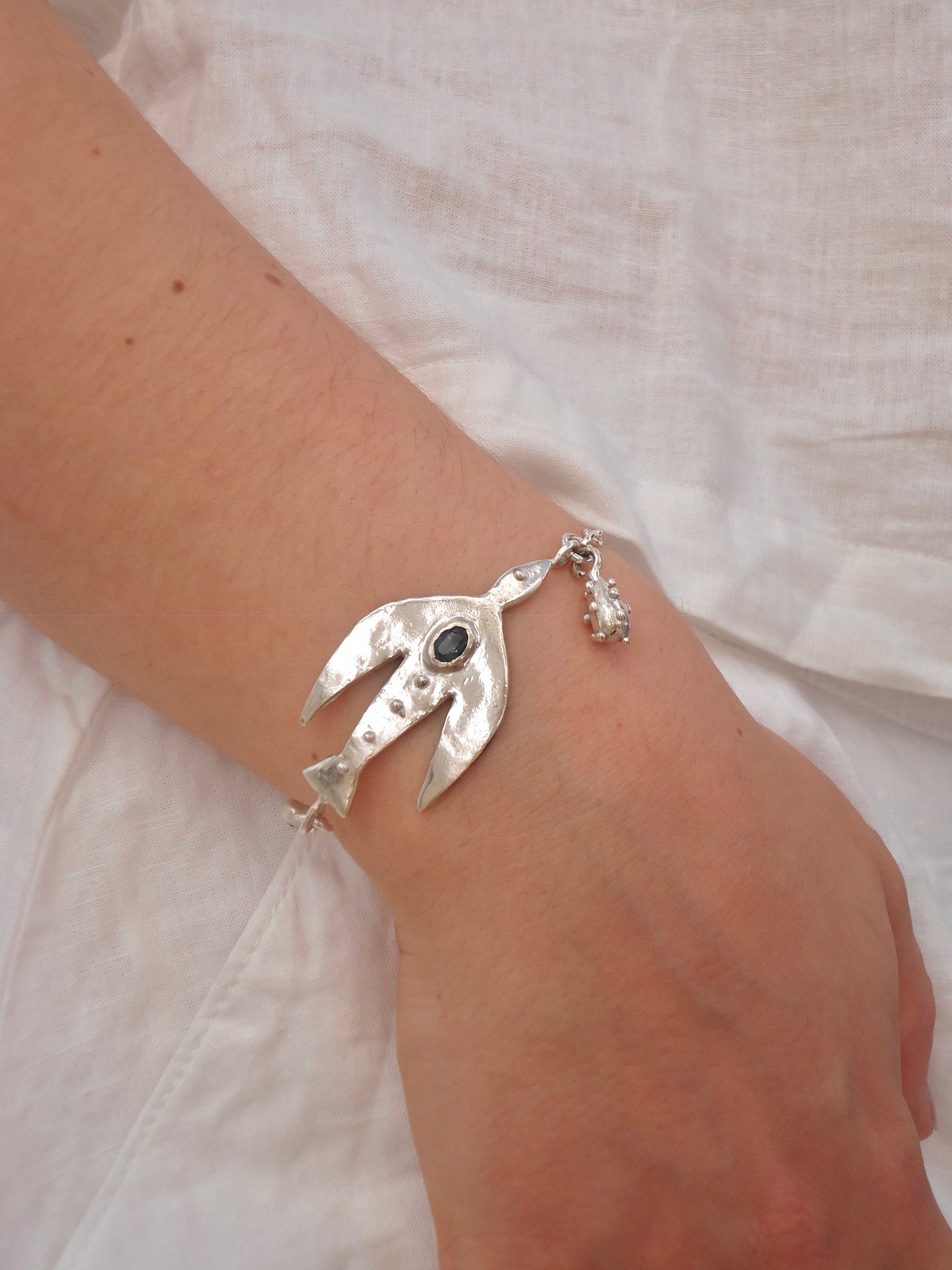 Topaz bird bracelet