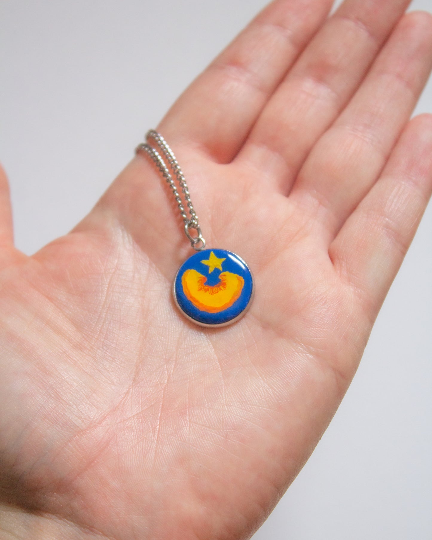 Peach slice pendant