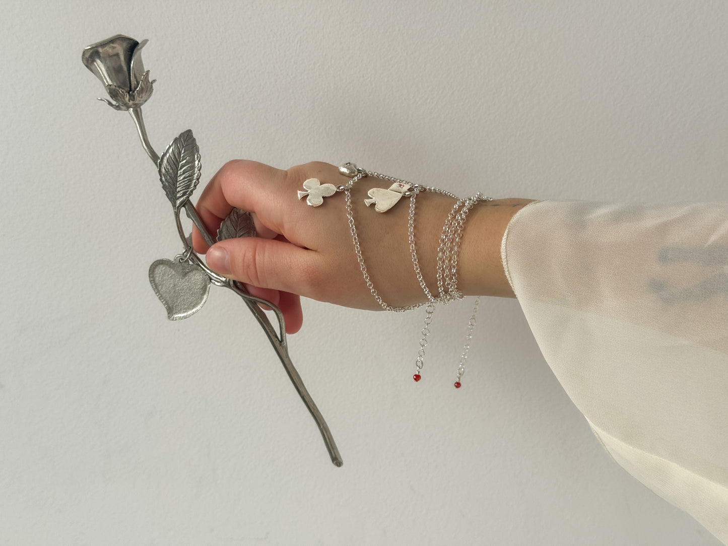 Spade and clubs charm necklaces
