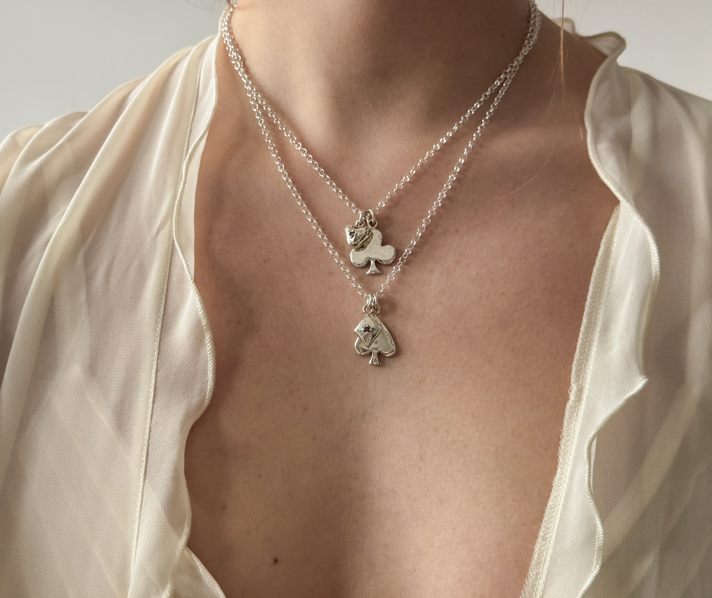 Spade and clubs charm necklaces