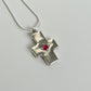 Pink sapphire cross necklace