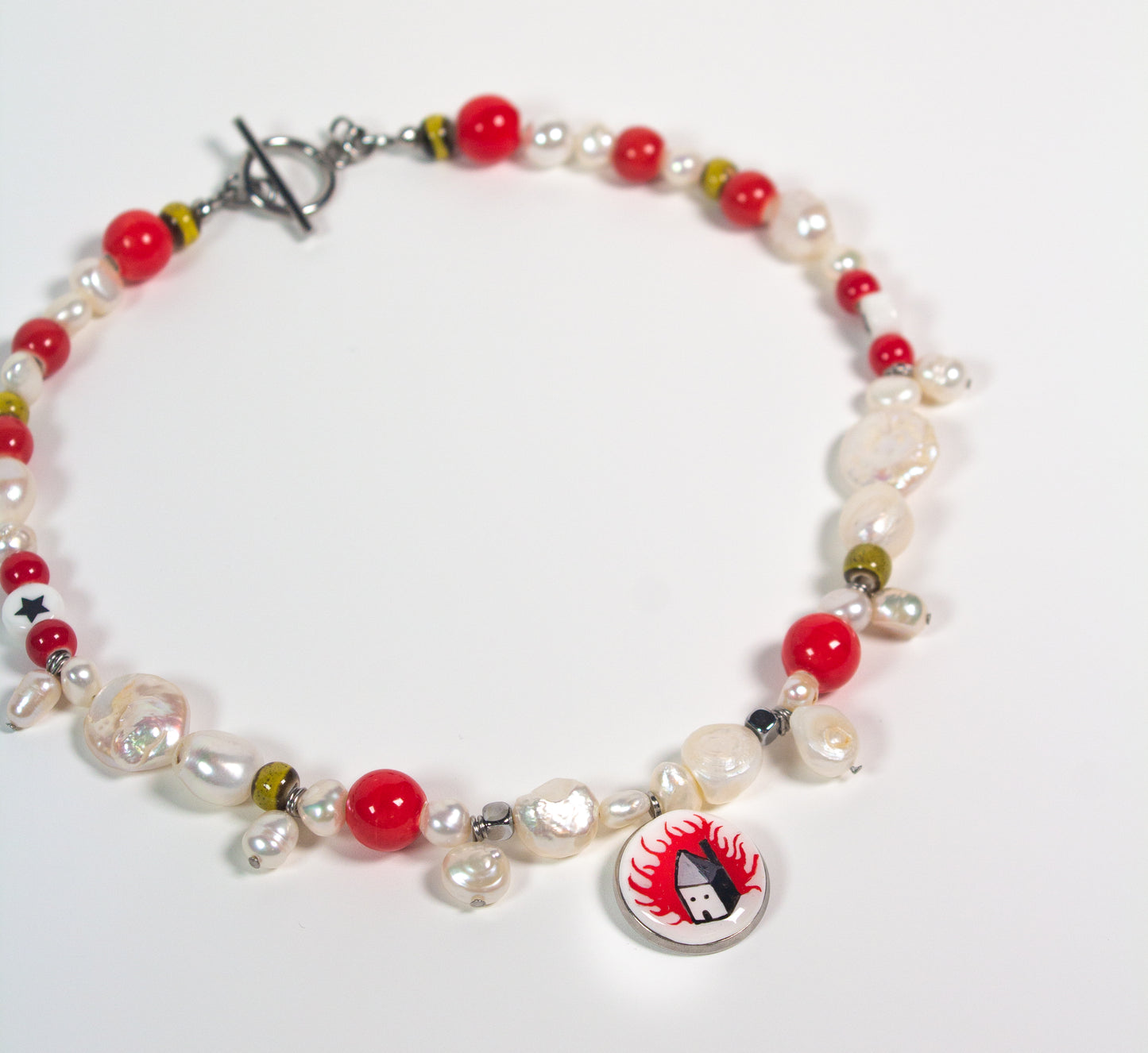 Burning house necklace