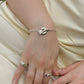 Quatrefoil latch bracelet