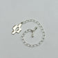 Quatrefoil latch bracelet