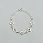 Quatrefoil link bracelet