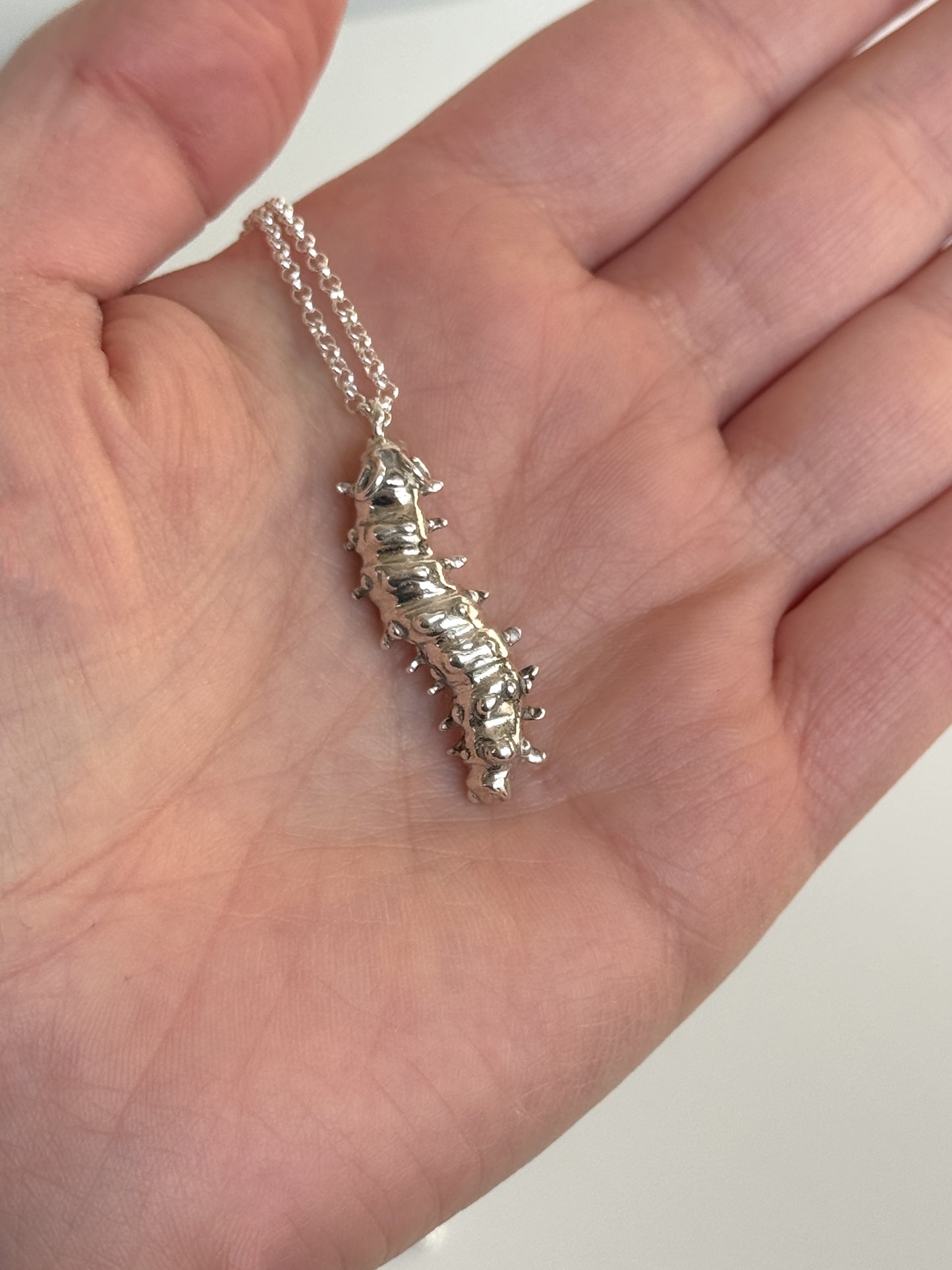 Caterpillar charm